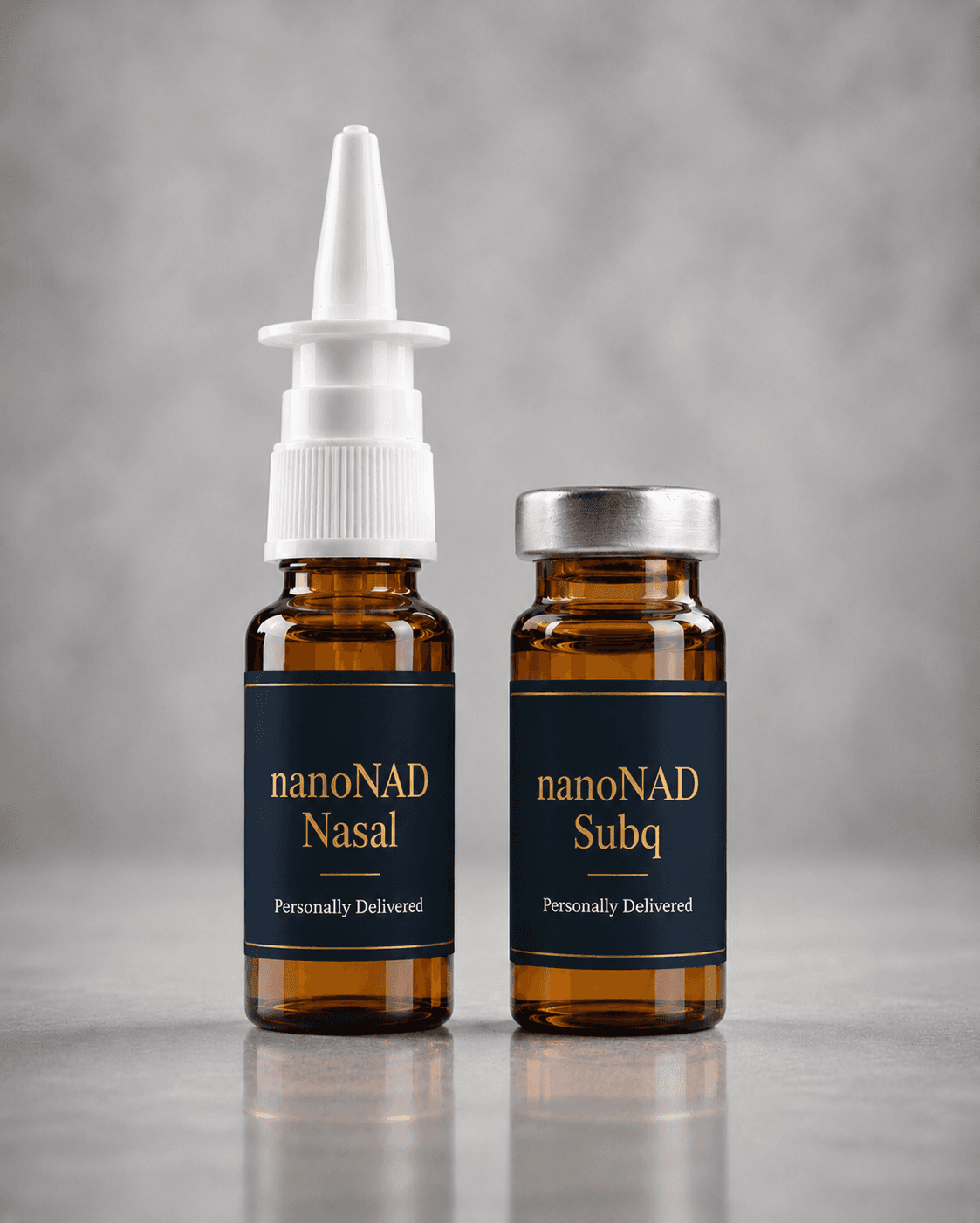 Crystal Clear RX Wellness NanoNAD nasal spray and injectable vial with navy labels and gold product names on pale stone.